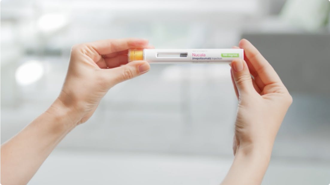 NUCALA Autoinjector held with two hands NUCALA Autoinjector held with two hands