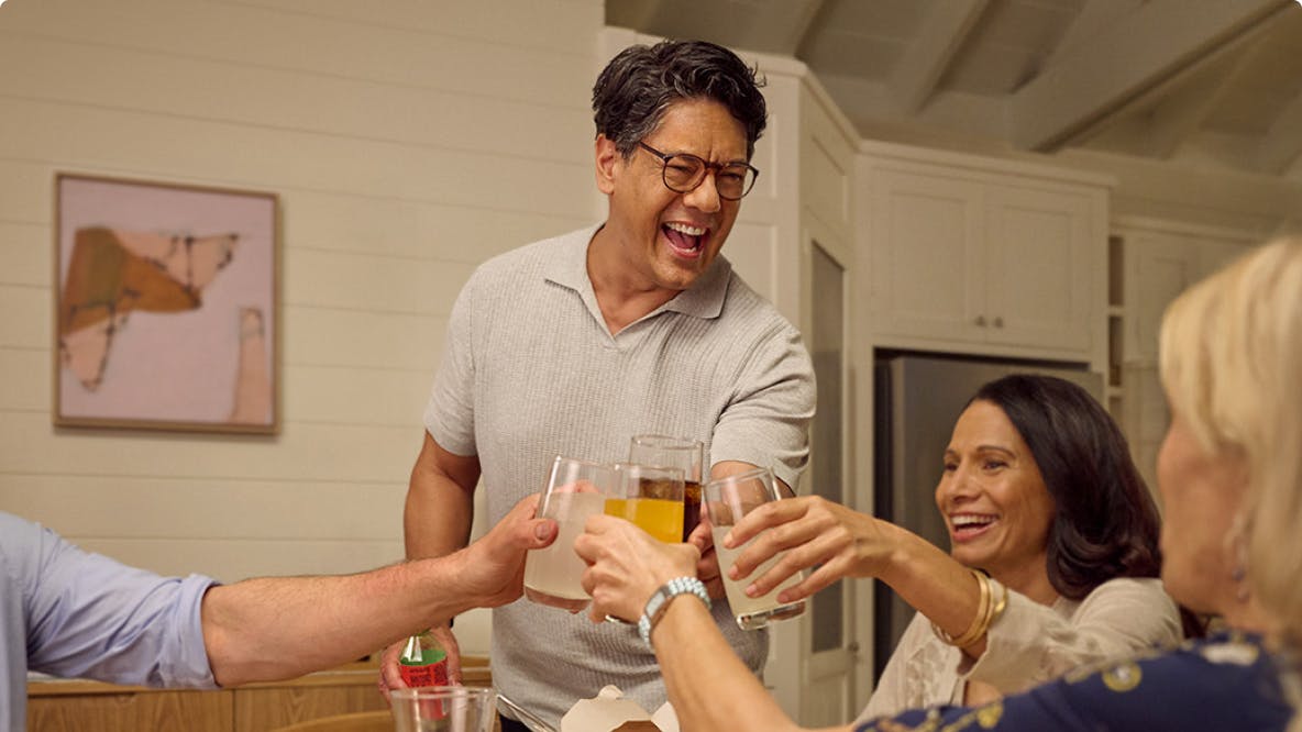 Nasal polyps patient Marco and friends touching their glasses together