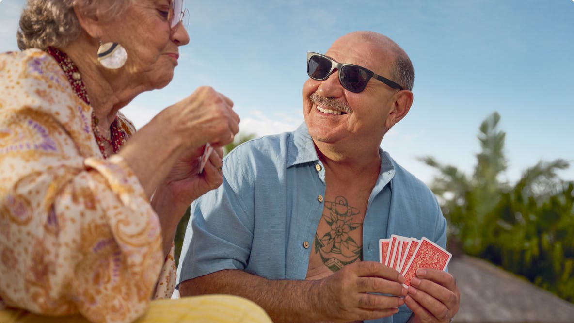 COPD patient Nicholas playing cards with a female friend