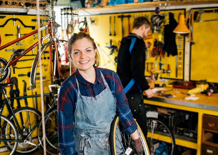 Image:Woman in Bike Shop Image:Woman in Bike Shop
