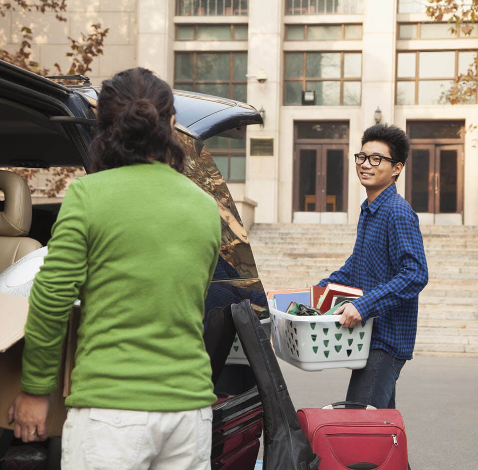 Mom helping teen move