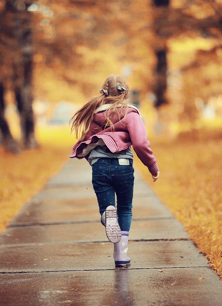 Girl running outdoors