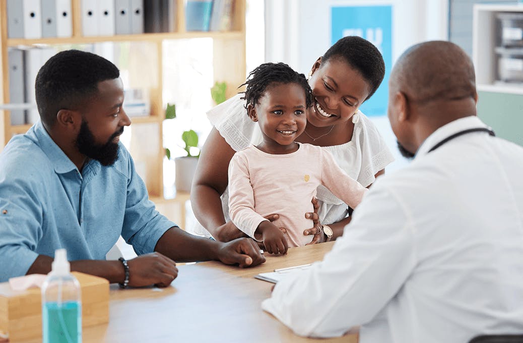 Family in doctor appointment with a baby