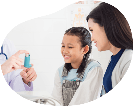 Image: Doctor Showing Patient How to Use Inhaler