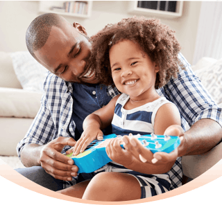 Banner: Parent and Child Playing Guitar