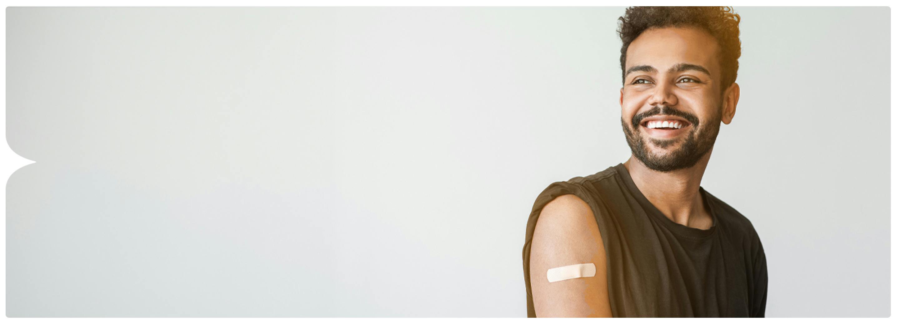 Image: Male patient with Band-Aid on arm
