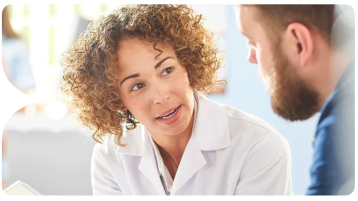 Image: Pharmacist talking to patient