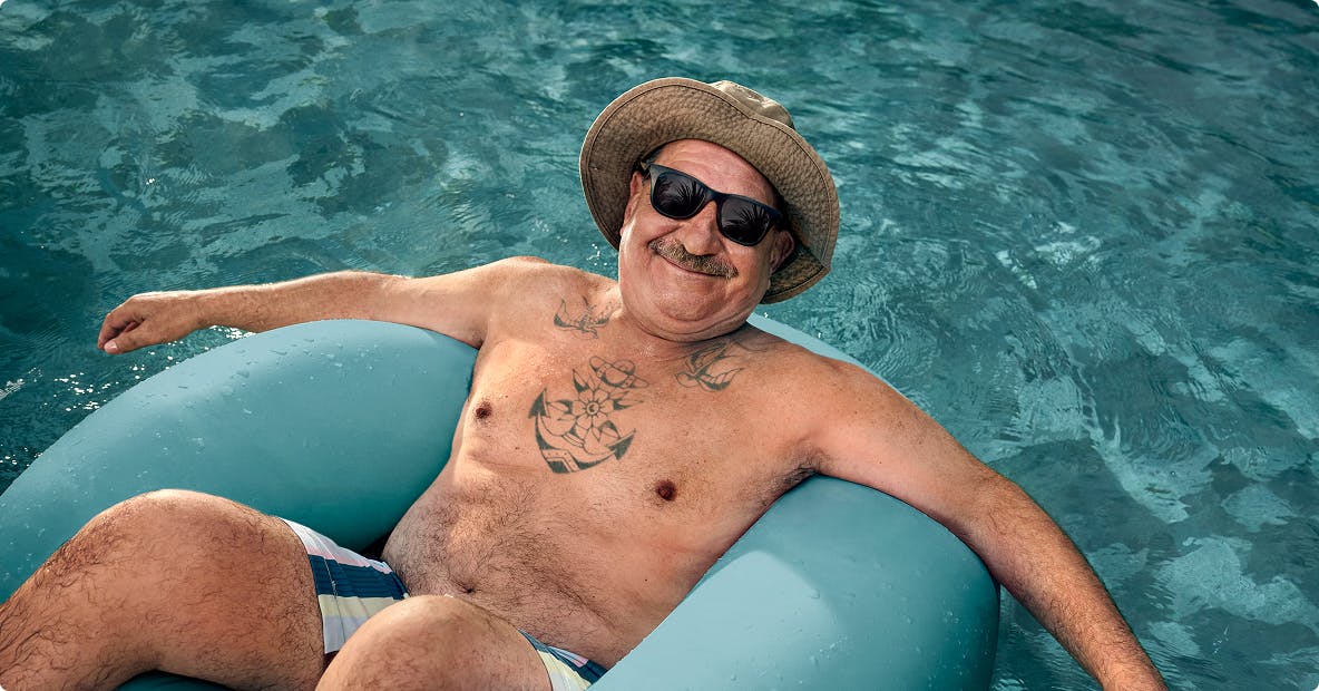COPD patient Nicholas floating in a pool