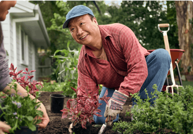 EGPA patient Ken gardening with his wife