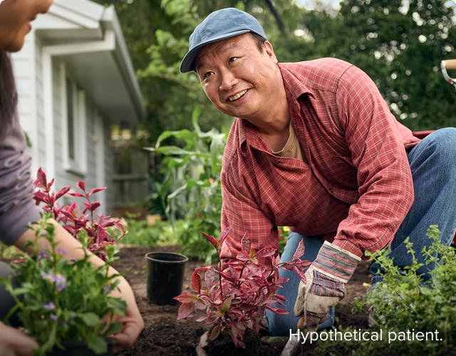 EGPA patient Ken gardening with his wife