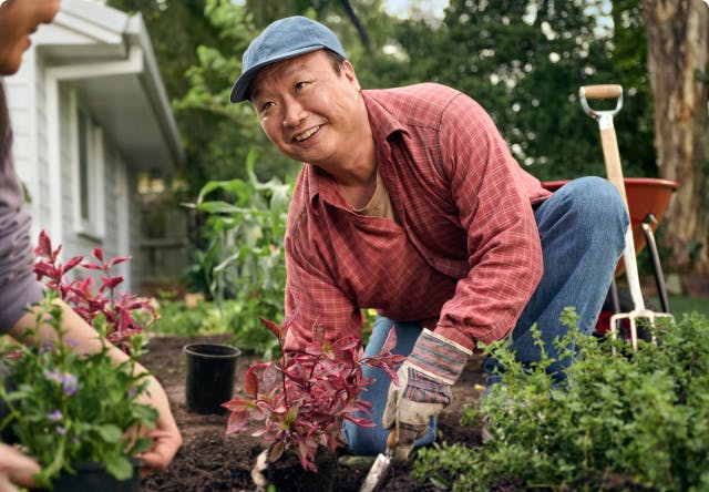 EGPA patient Ken gardening with his wife
