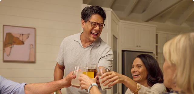Nasal polyps patient Marco and friends touching their glasses together