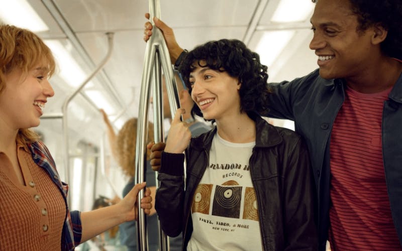 Image of woman on the train with friends