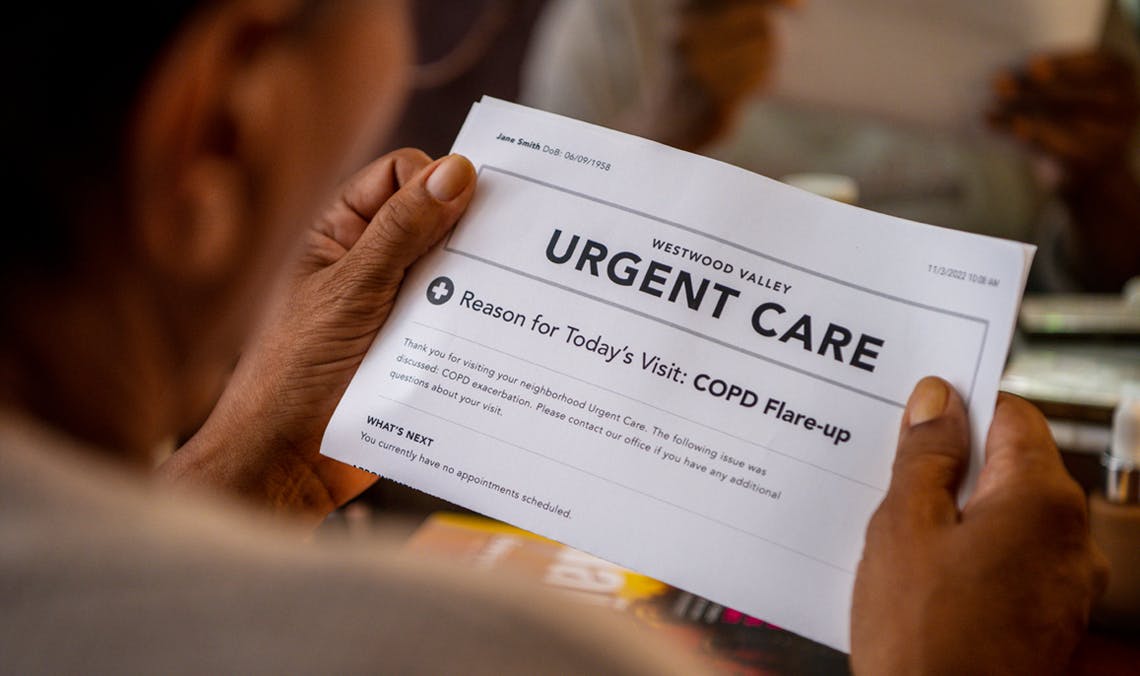 Image of woman reading document on COPD Flare-up