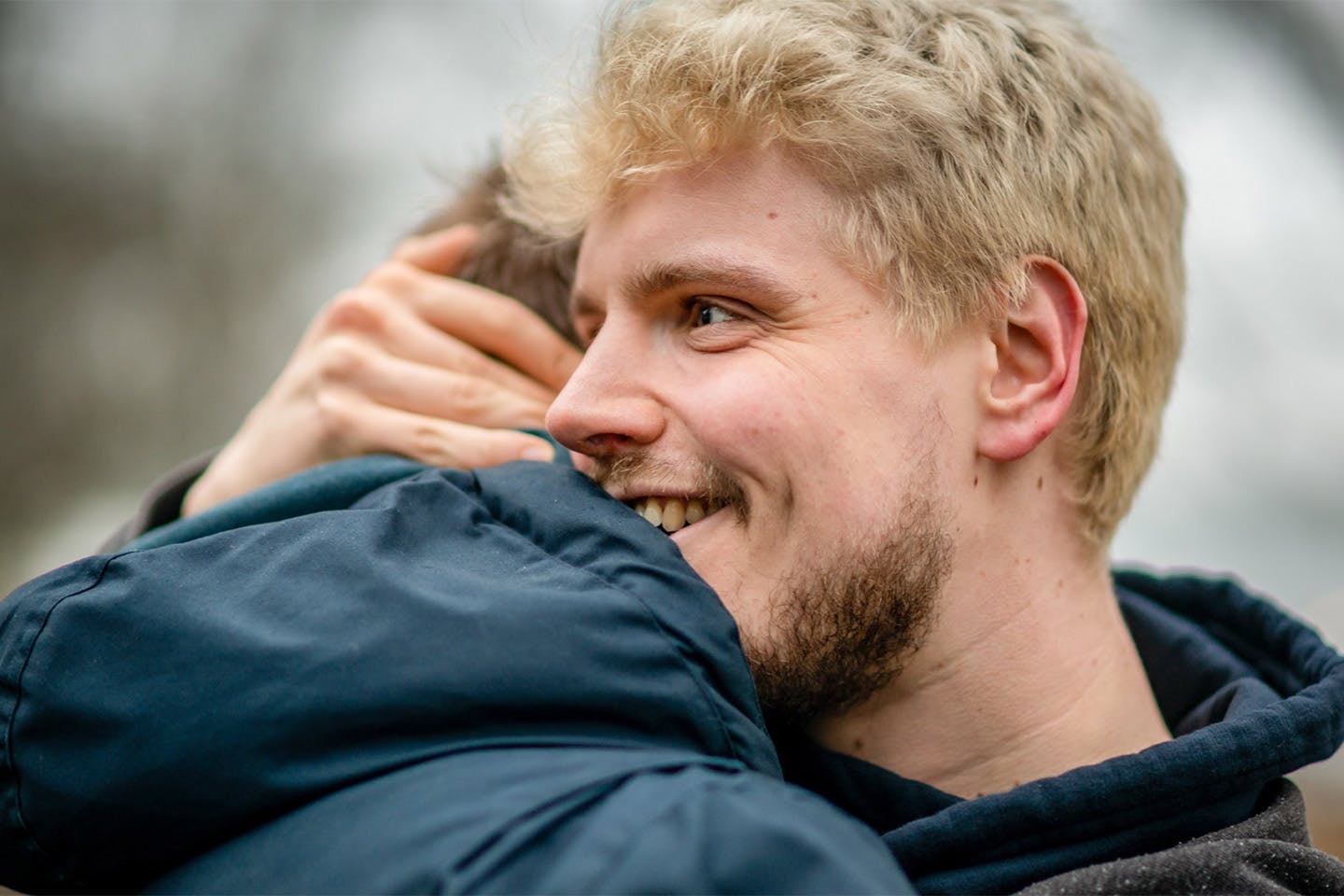 Two people hugging