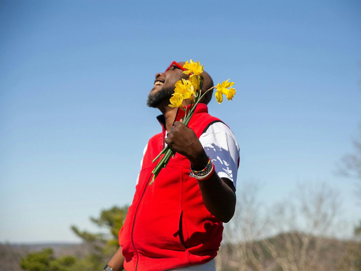 Happy man holding flower