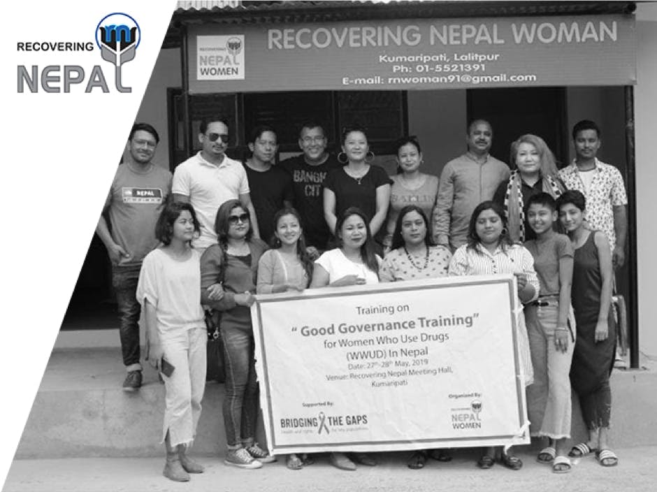 Members of Recovering Nepal stand outside their offices in Kathmandu 