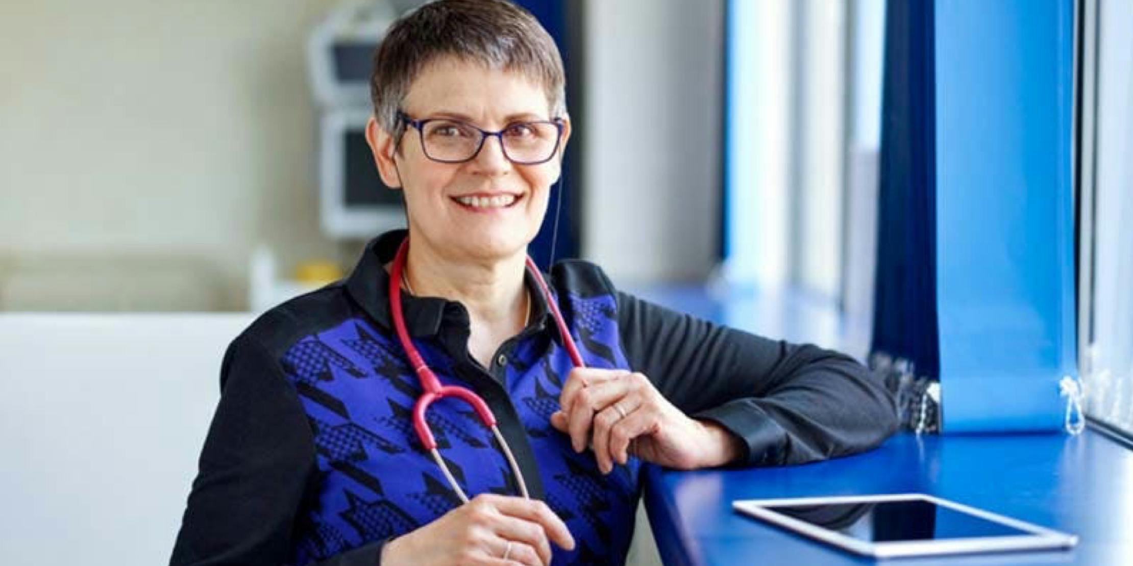 Smiley healthcare professional with stethoscope