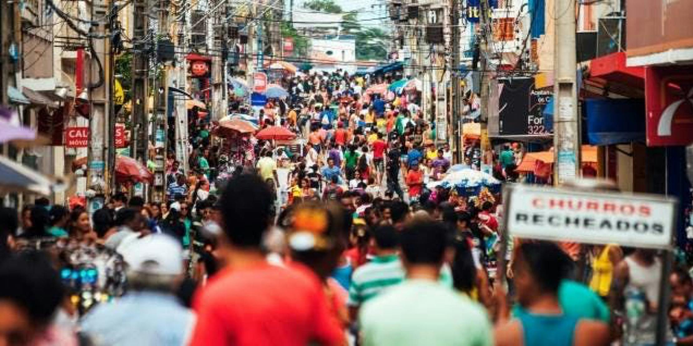 crowded road with a lot of pedestrians 