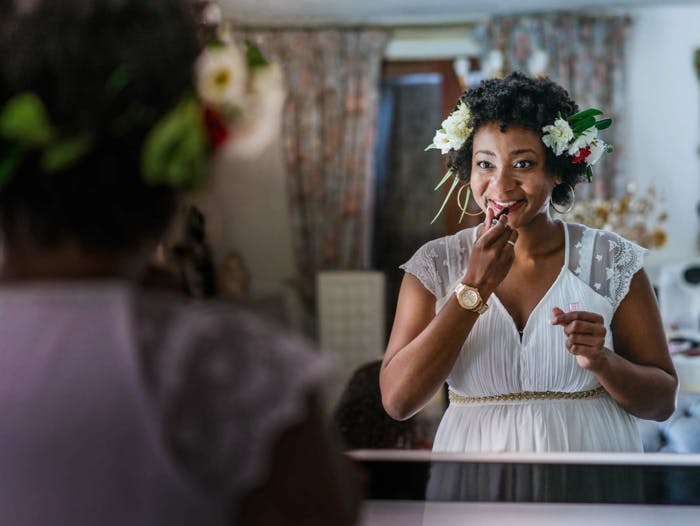 Woman applying makeup