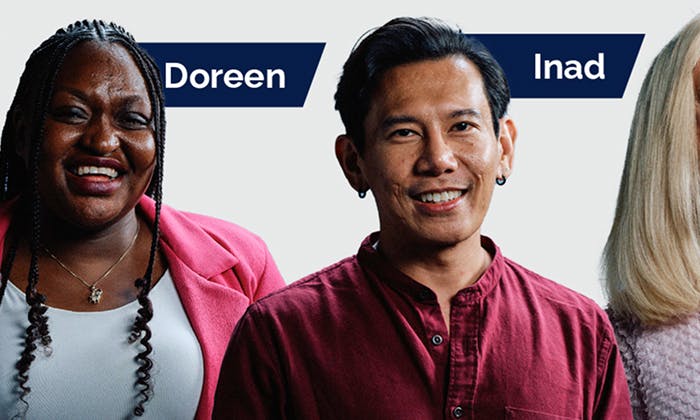 Two people with visible name tags reading Doreen and Inad, standing together.