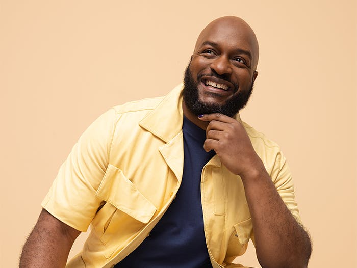 Happy man wearing a yellow shirt Happy man wearing a yellow shirt