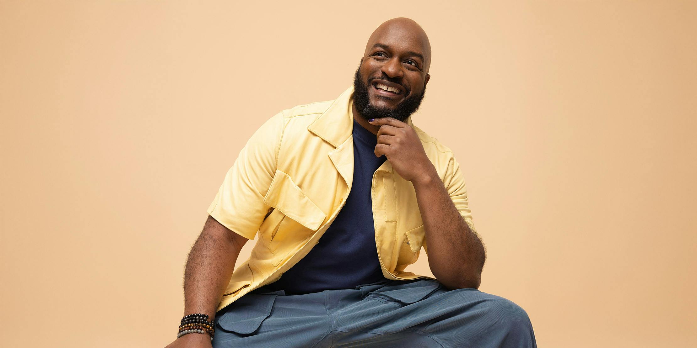 Happy man wearing a yellow shirt Happy man wearing a yellow shirt